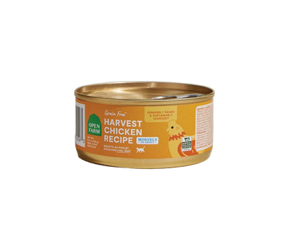 Can of 'Harvest Chicken Recipe' cat food with a gold lid on a beige background
