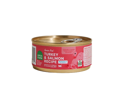 Can of turkey and salmon recipe cat food on a beige background